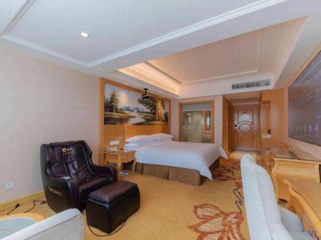 Bed in Vienna Hotel Guangdong Qingyuan Wanda Plaza Xincheng Beijiang