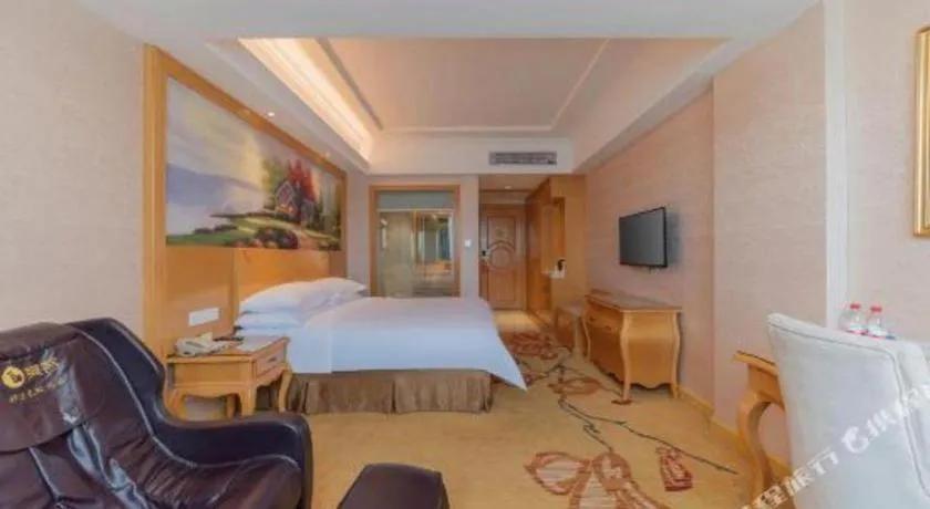 Bed in Vienna Hotel Guangdong Qingyuan Wanda Plaza Xincheng Beijiang