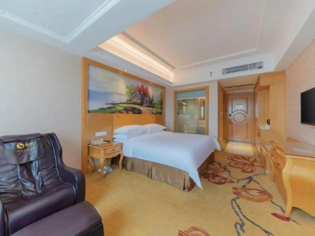Bed in Vienna Hotel Guangdong Qingyuan Wanda Plaza Xincheng Beijiang