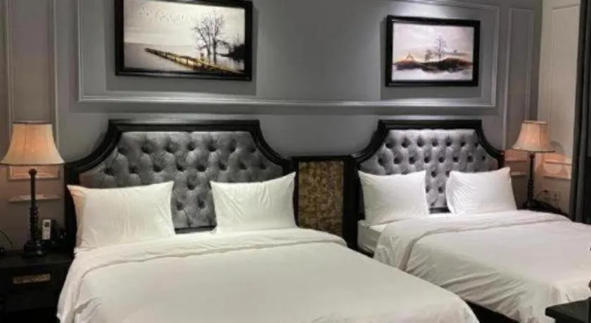 Bed in Malisa Hotel