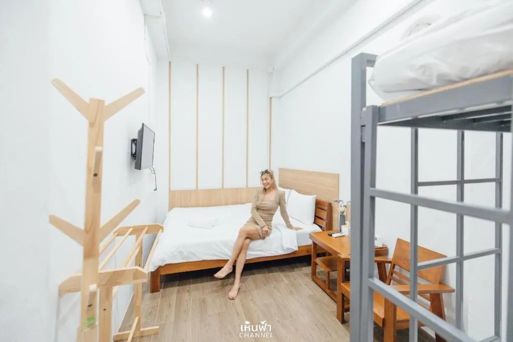 Bed in Sirichai Design Hotel