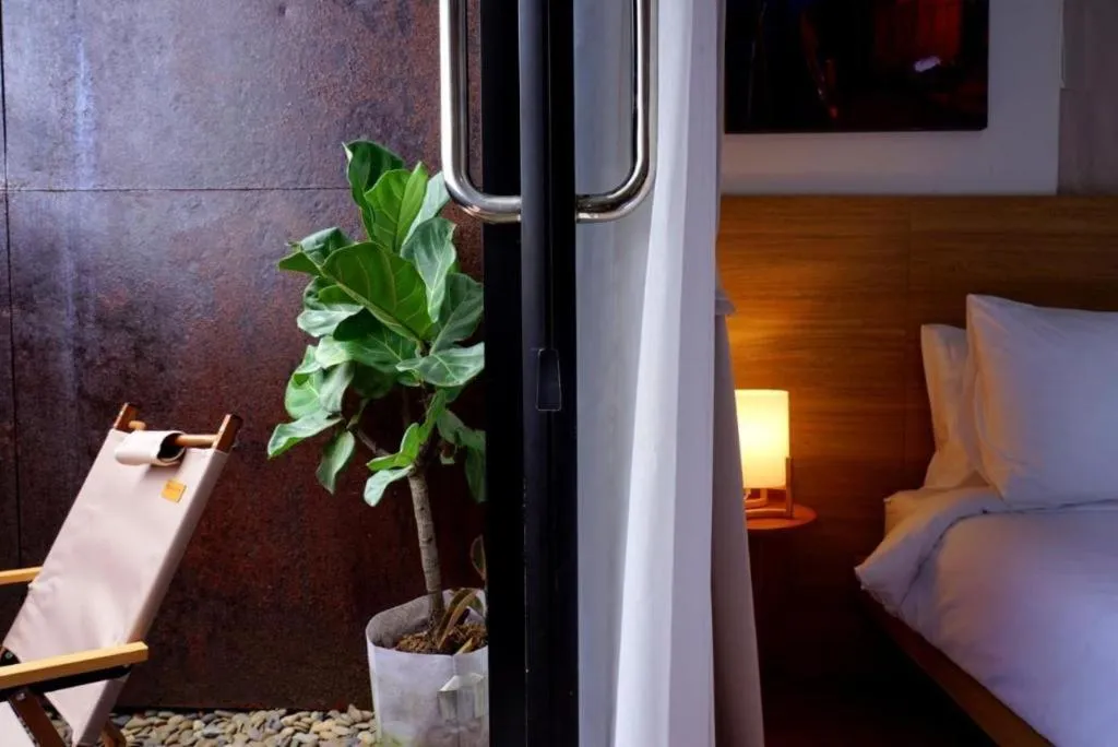 Bed in Sirichai Design Hotel