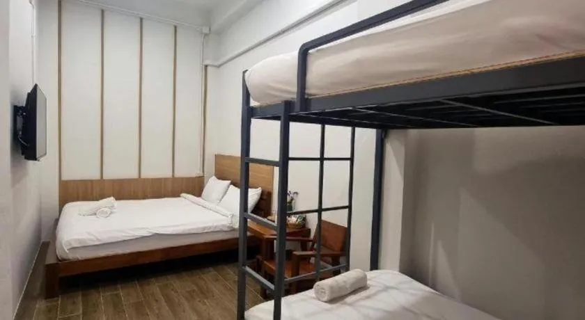 Bed in Sirichai Design Hotel