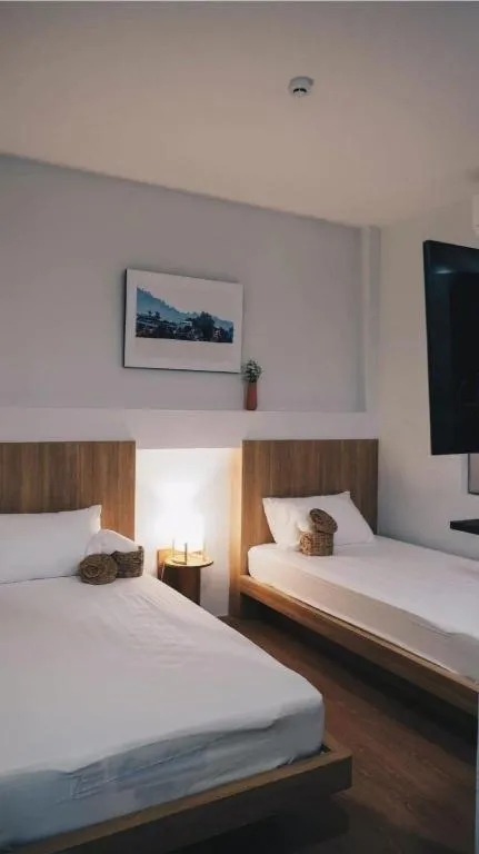 Bed in Sirichai Design Hotel