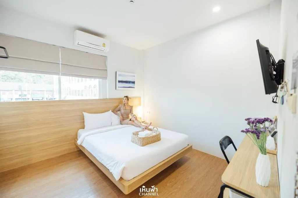 Bed in Sirichai Design Hotel