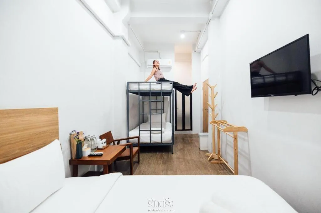 Bed in Sirichai Design Hotel