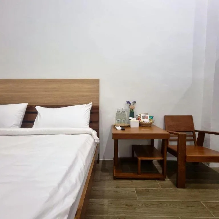 Bed in Sirichai Design Hotel