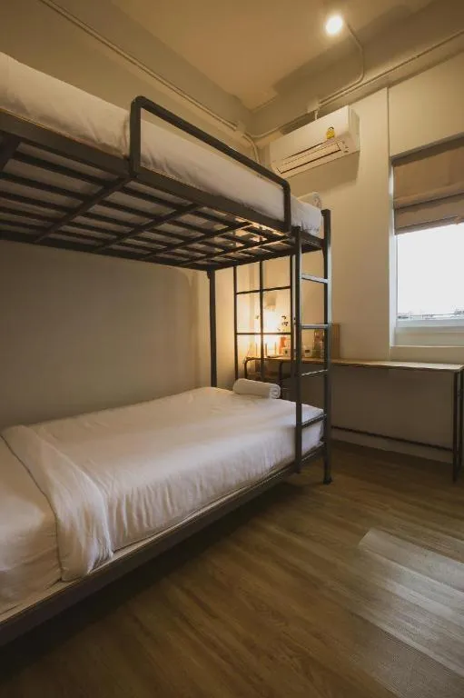 Bed in Sirichai Design Hotel