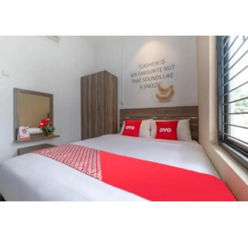 Bed in OYO Life 3246 Walnut Inn G-10