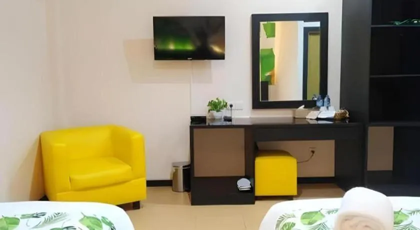 Bed in Tropical Point Hotel Syariah