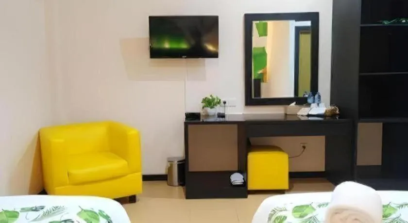 Bed in Tropical Point Hotel Syariah