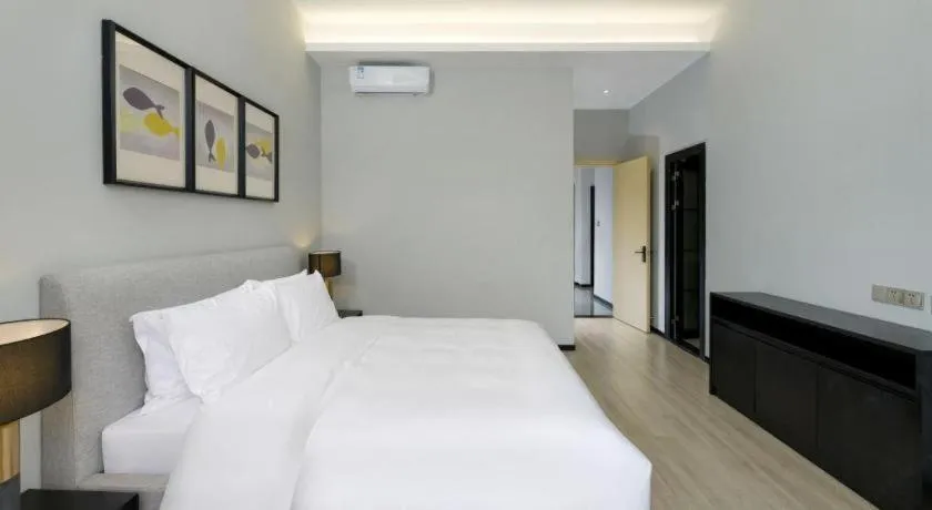 Bed in SongShan Lake PingShang Serviced Hotel