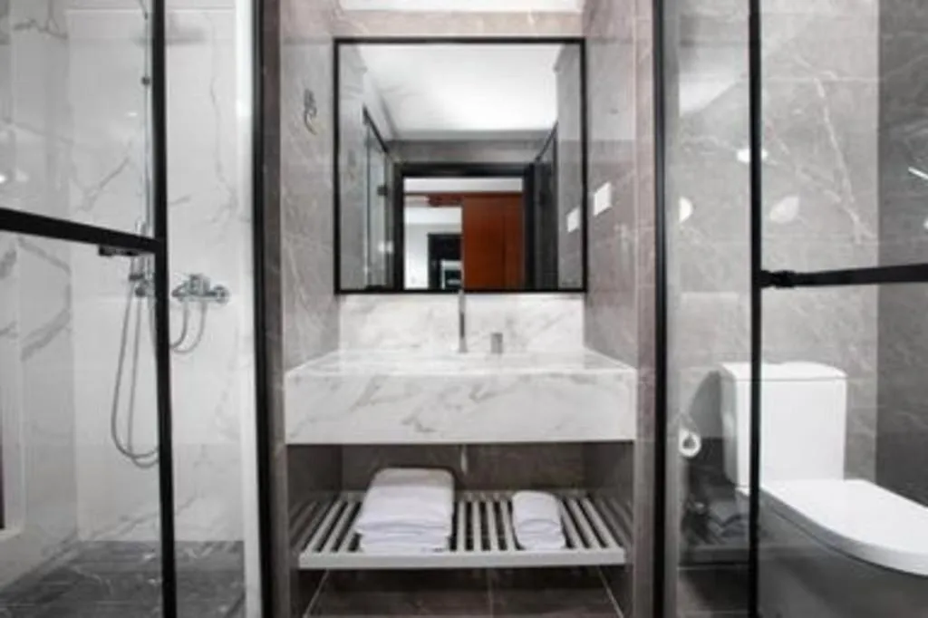 Bed in Ramada Encore by Wyndham Qionghai Downtown