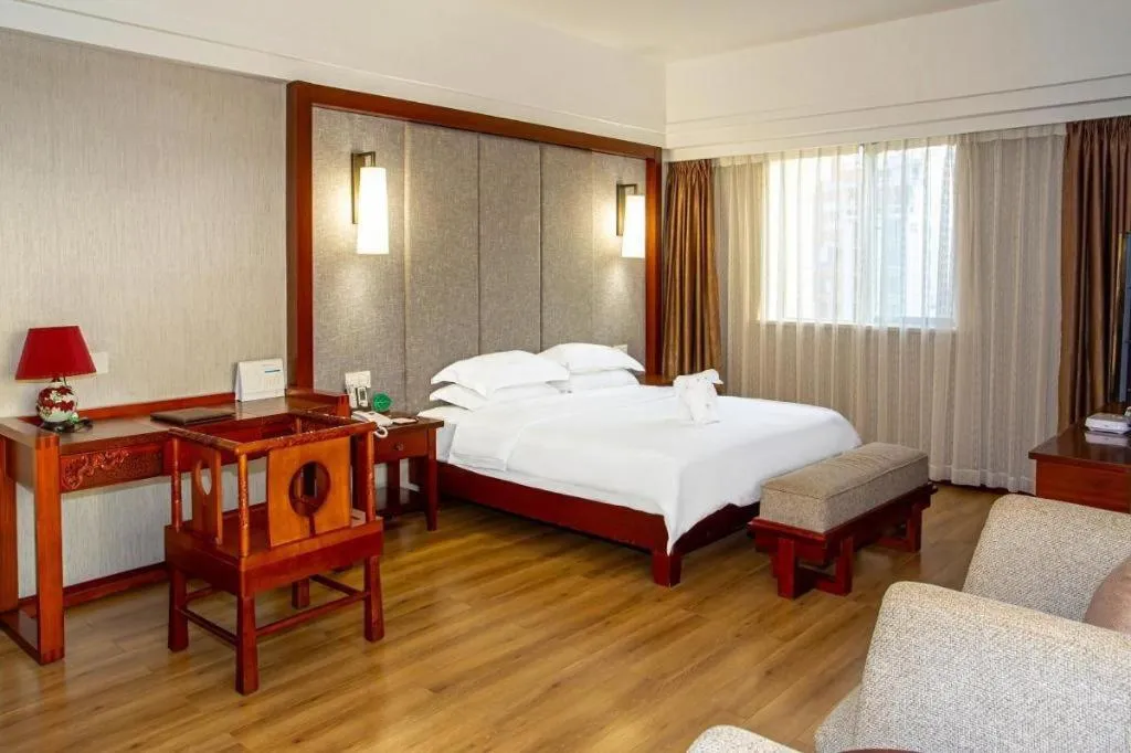 Bed in Ramada Encore by Wyndham Qionghai Downtown