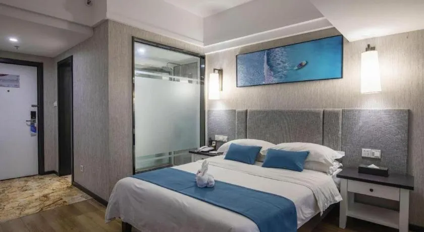 Bed in Ramada Encore by Wyndham Qionghai Downtown