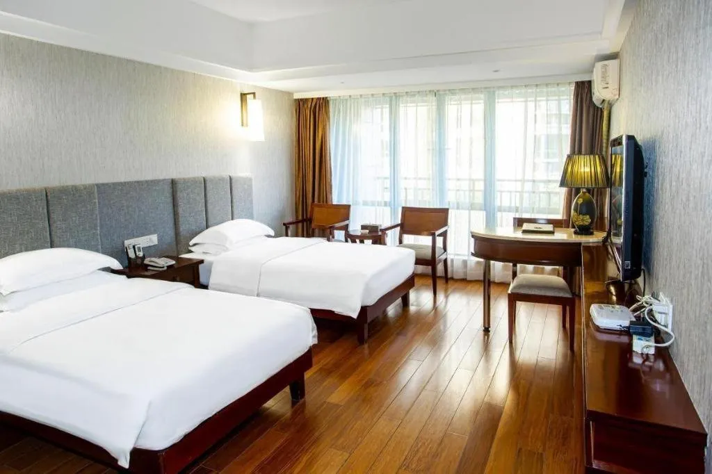 Bed in Ramada Encore by Wyndham Qionghai Downtown