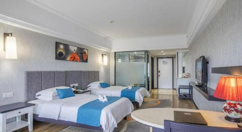 Bed in Ramada Encore by Wyndham Qionghai Downtown