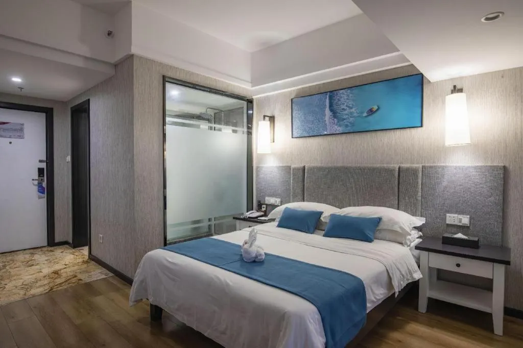 Bed in Ramada Encore by Wyndham Qionghai Downtown