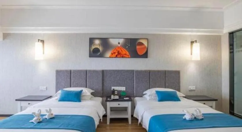 Bed in Ramada Encore by Wyndham Qionghai Downtown