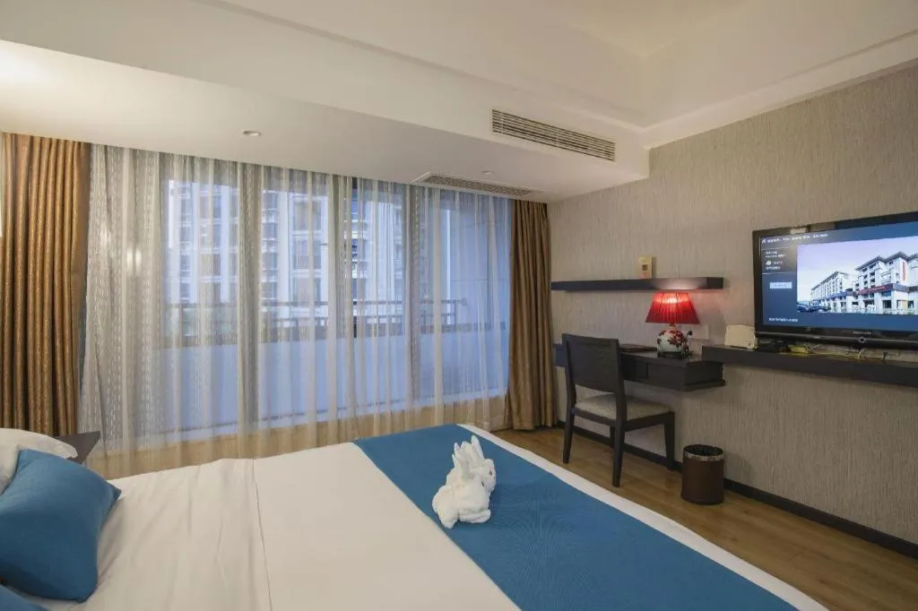 Bed in Ramada Encore by Wyndham Qionghai Downtown