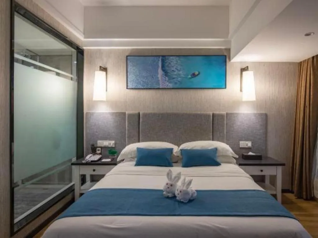 Bed in Ramada Encore by Wyndham Qionghai Downtown