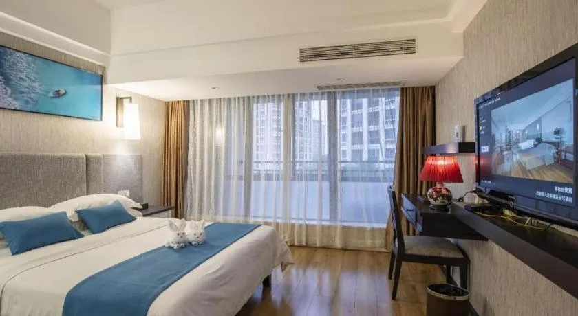 Bed in Ramada Encore by Wyndham Qionghai Downtown