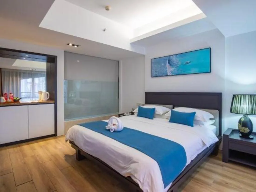 Bed in Ramada Encore by Wyndham Qionghai Downtown