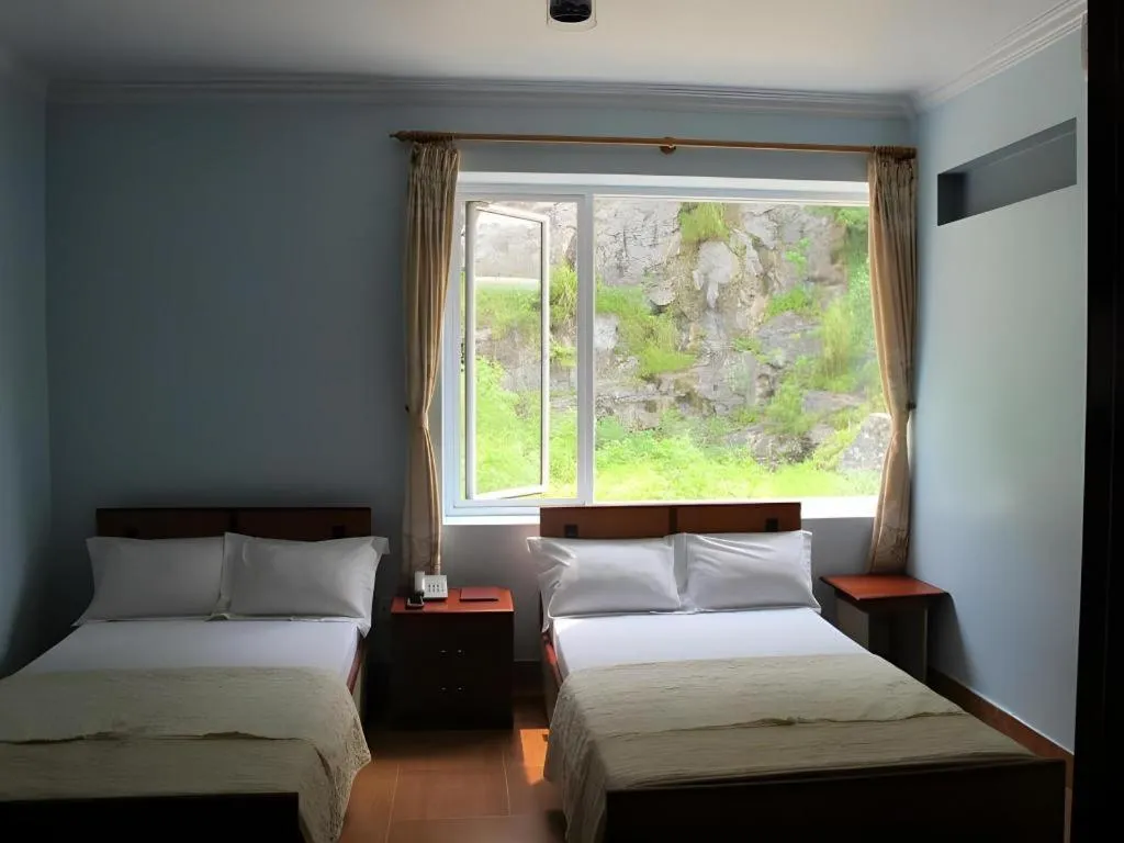 Bed in Ciao CatBa Hotel