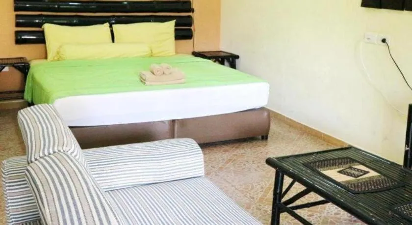 Bed in Kamala Tropical Garden Hotel