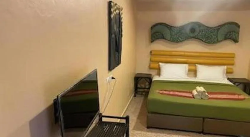 Bed in Kamala Tropical Garden Hotel