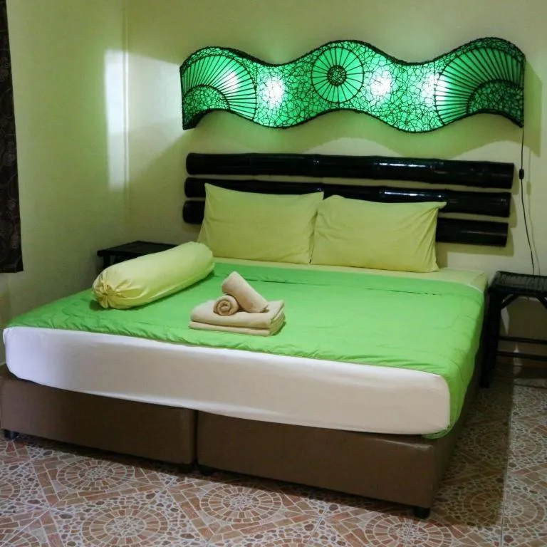 Bed in Kamala Tropical Garden Hotel
