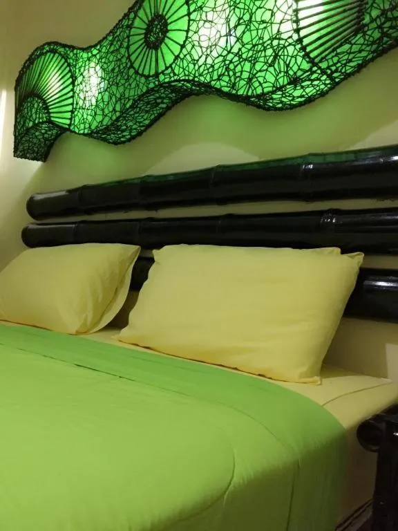 Bed in Kamala Tropical Garden Hotel