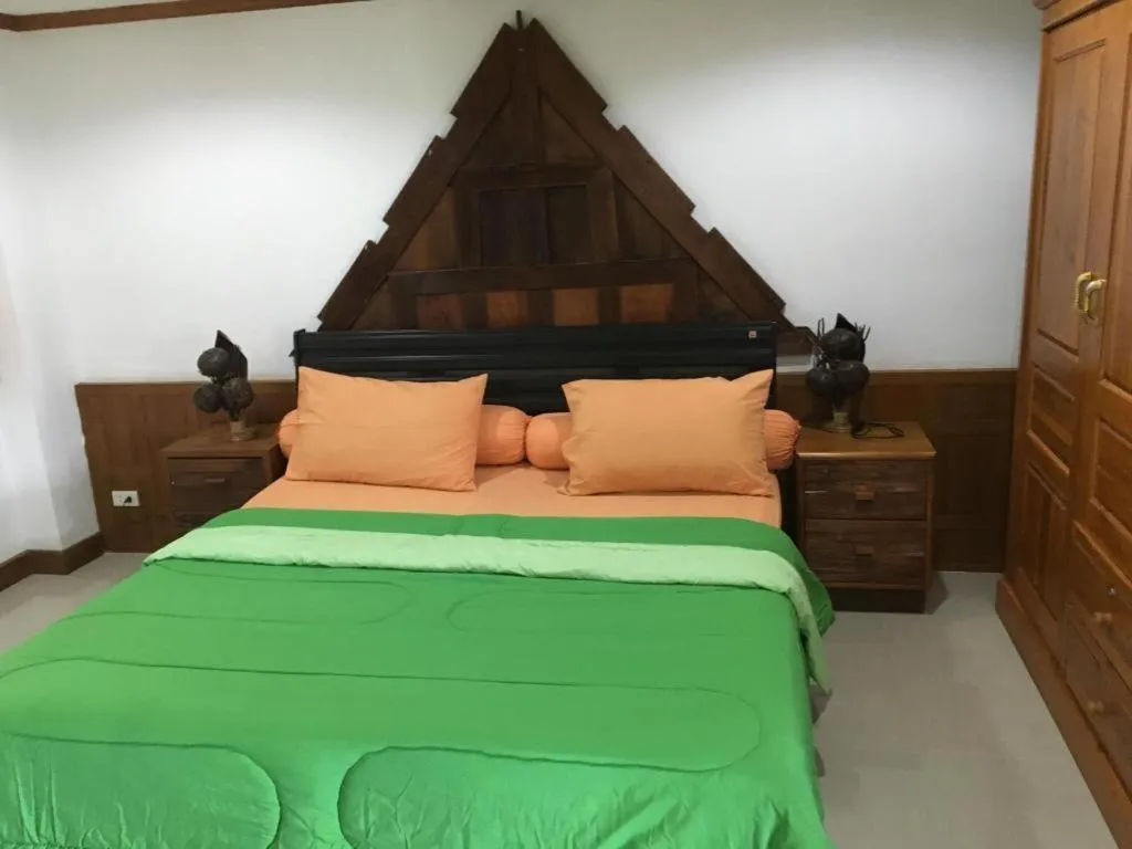 Bed in Kamala Tropical Garden Hotel