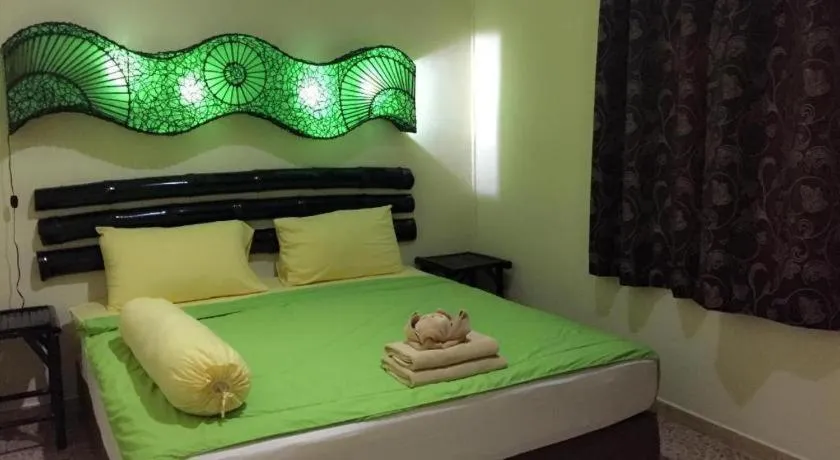 Bed in Kamala Tropical Garden Hotel