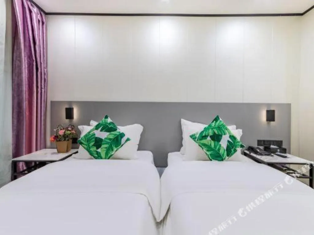 Bed in Xinghe Xinfeng Hotel Railway Station & Bus Station Branch