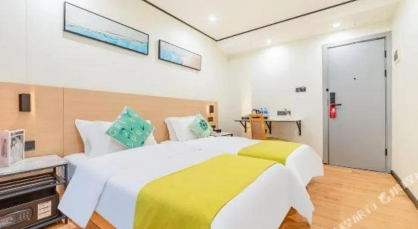 Bed in Xinghe Xinfeng Hotel Railway Station & Bus Station Branch