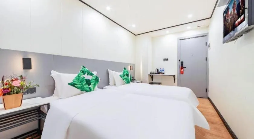 Bed in Xinghe Xinfeng Hotel Railway Station & Bus Station Branch