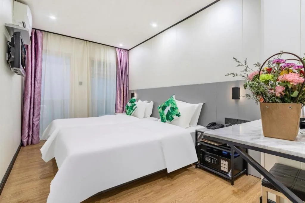 Bed in Xinghe Xinfeng Hotel Railway Station & Bus Station Branch