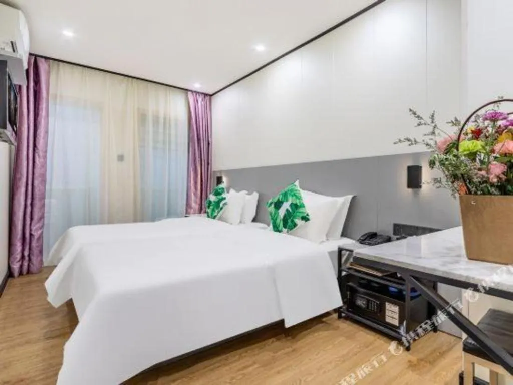 Bed in Xinghe Xinfeng Hotel Railway Station & Bus Station Branch