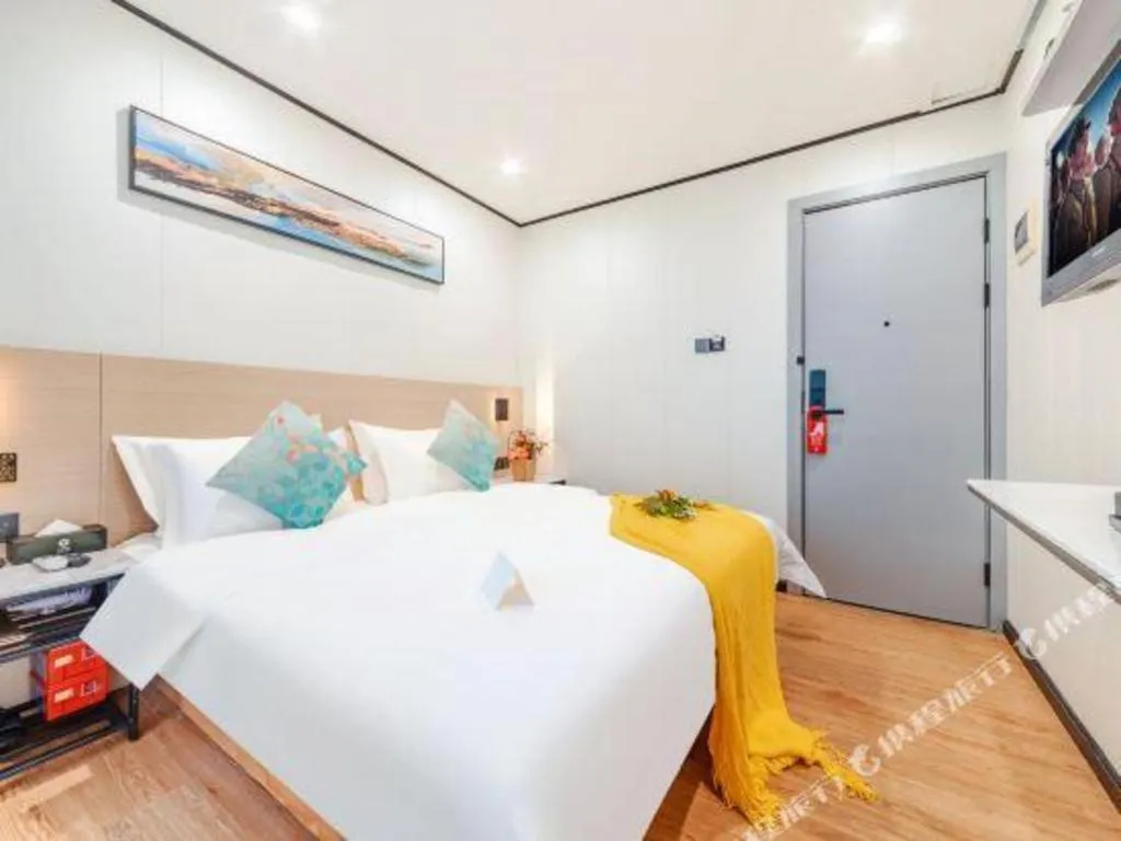 Bed in Xinghe Xinfeng Hotel Railway Station & Bus Station Branch