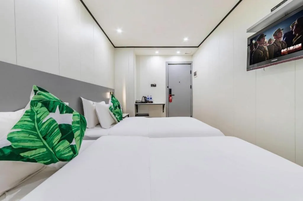 Bed in Xinghe Xinfeng Hotel Railway Station & Bus Station Branch