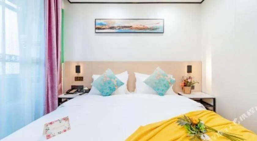 Bed in Xinghe Xinfeng Hotel Railway Station & Bus Station Branch