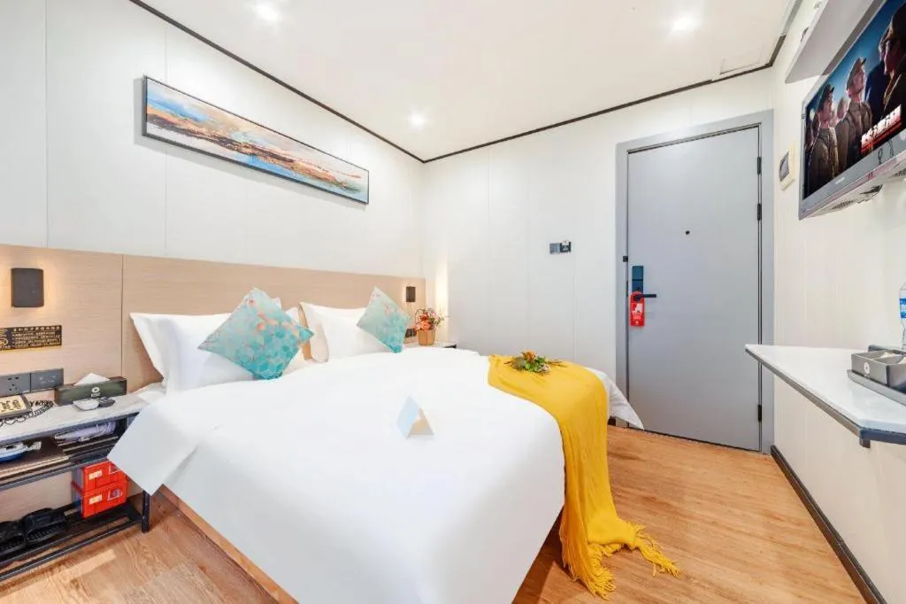 Bed in Xinghe Xinfeng Hotel Railway Station & Bus Station Branch