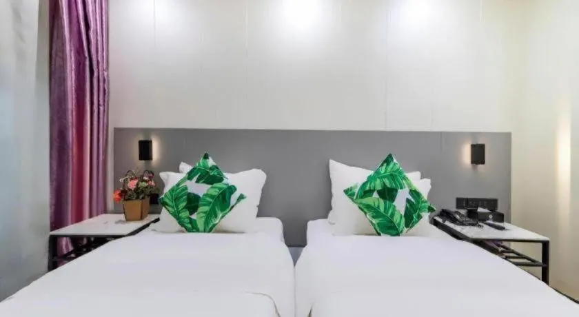 Bed in Xinghe Xinfeng Hotel Railway Station & Bus Station Branch