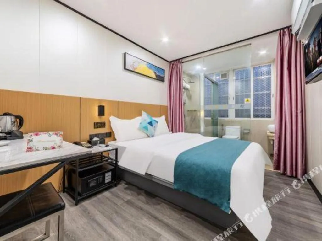 Bed in Xinghe Xinfeng Hotel Railway Station & Bus Station Branch