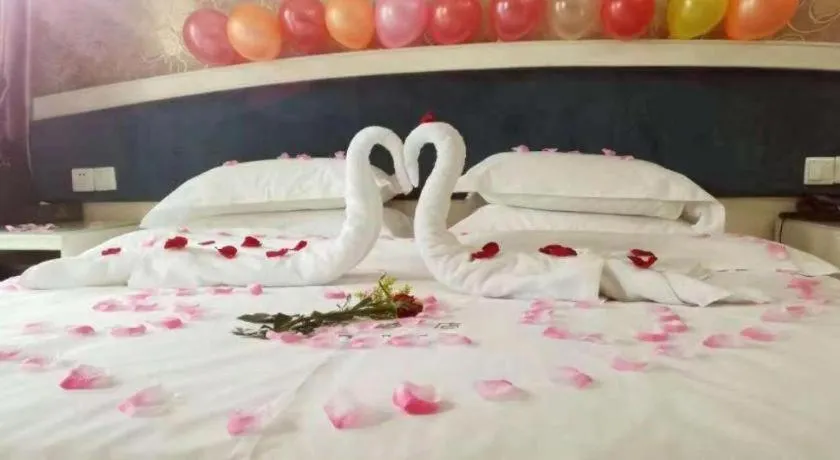 Bed in Xinghe Xinfeng Hotel Railway Station & Bus Station Branch