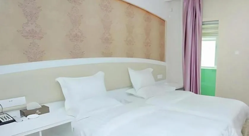 Bed in Xinghe Xinfeng Hotel Railway Station & Bus Station Branch