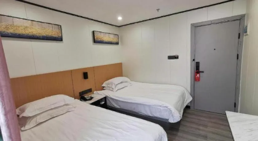 Bed in Xinghe Xinfeng Hotel Railway Station & Bus Station Branch