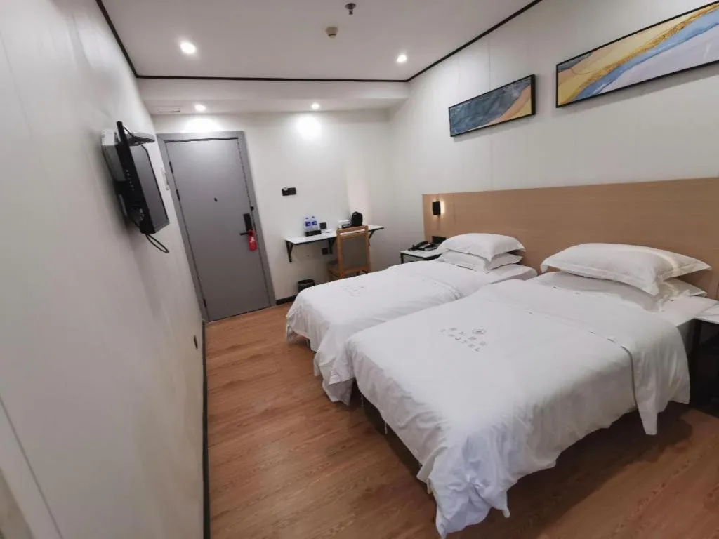 Bed in Xinghe Xinfeng Hotel Railway Station & Bus Station Branch