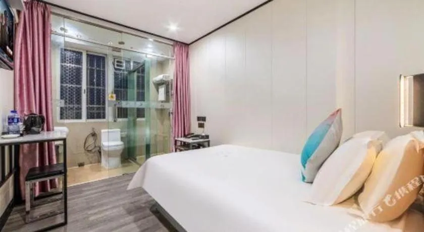 Bed in Xinghe Xinfeng Hotel Railway Station & Bus Station Branch